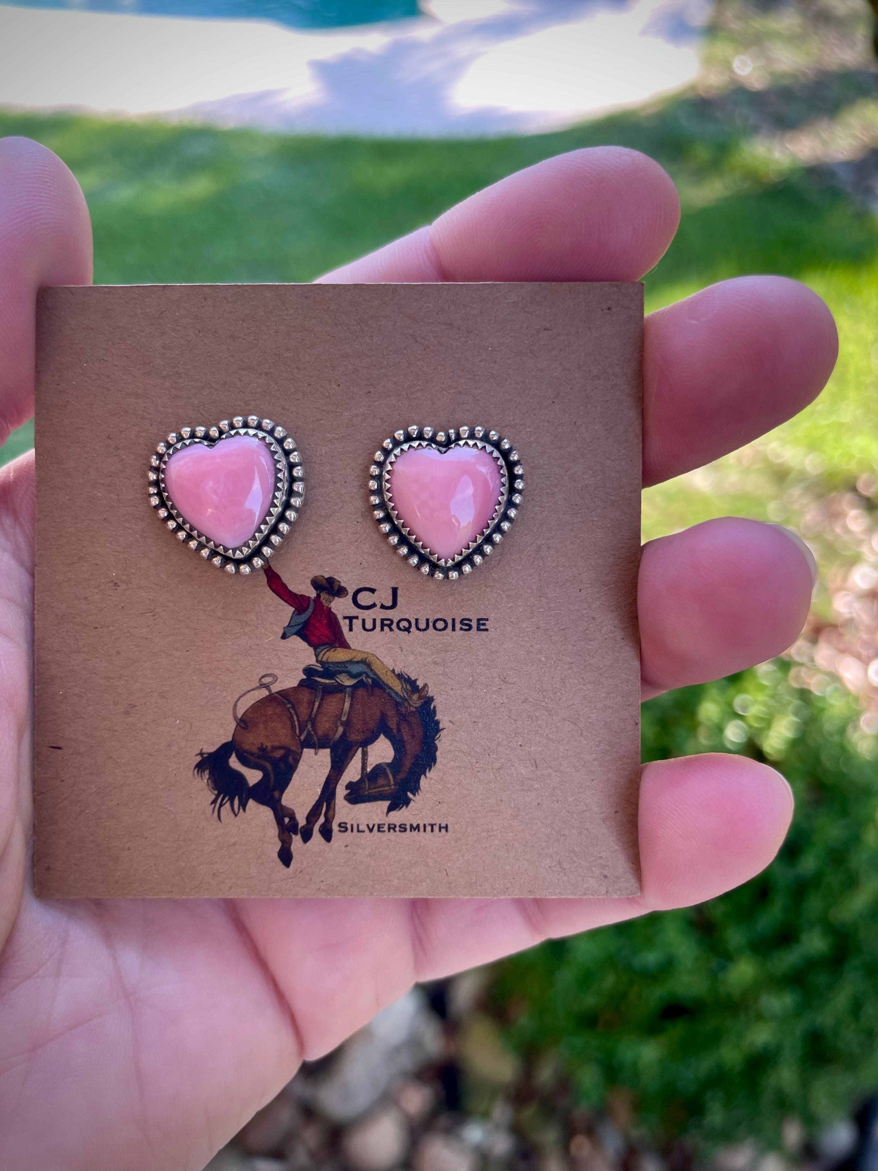 Pink conch heart studs